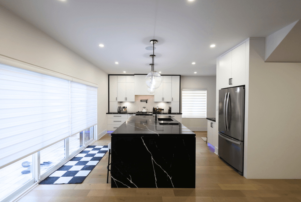 Modern renovated kitchen with island in a GTA home built by Camstruct