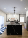 Modern renovated kitchen with island in a GTA home built by Camstruct