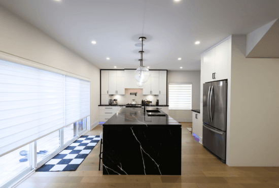 Modern renovated kitchen with island in a GTA home built by Camstruct